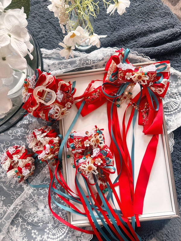 Red Oriental style ribbon hair clip