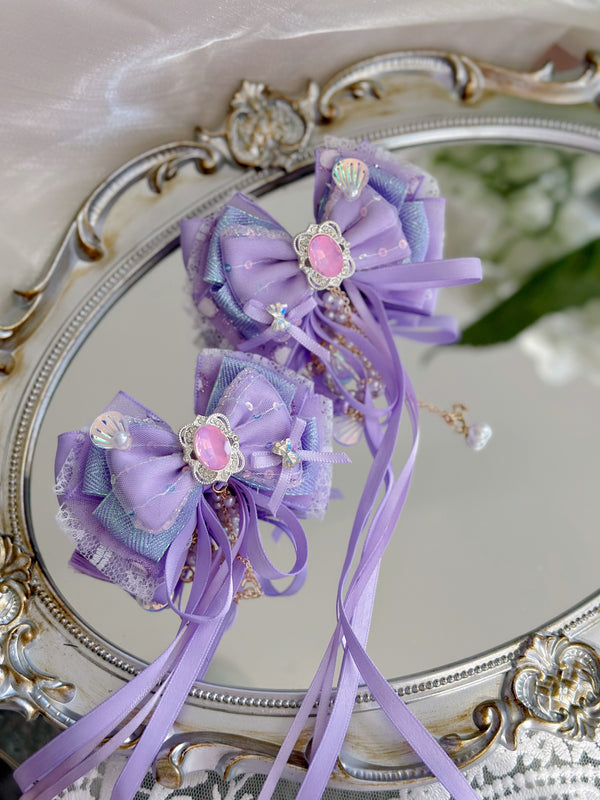 Purple Lolita bows in pairs