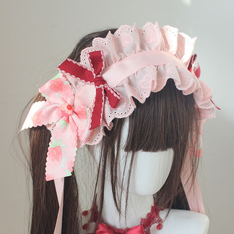 Original handmade Strawberry Fantasy trinkets, pink cake hat, cute lolita style headband, and hand clips.